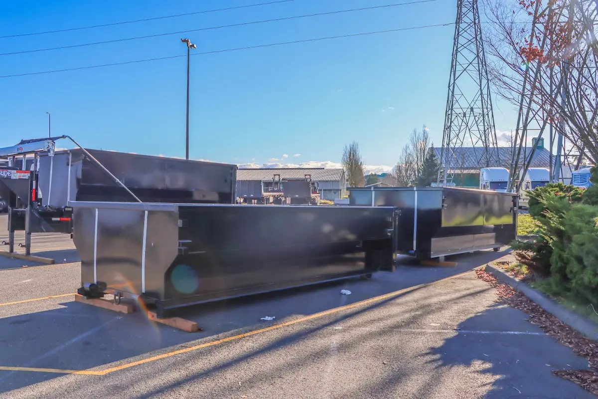 Roll-off dumpster ready for waste disposal at job site for 4 Yard Dumpster Rental in Harvard